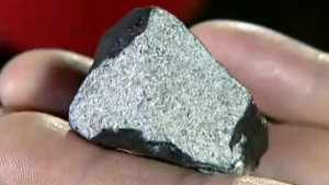 Dr Henning Haack presenting the largest fragment of the Ejby meteorite to the media on 7 February 2016 (image: tv2.dk)